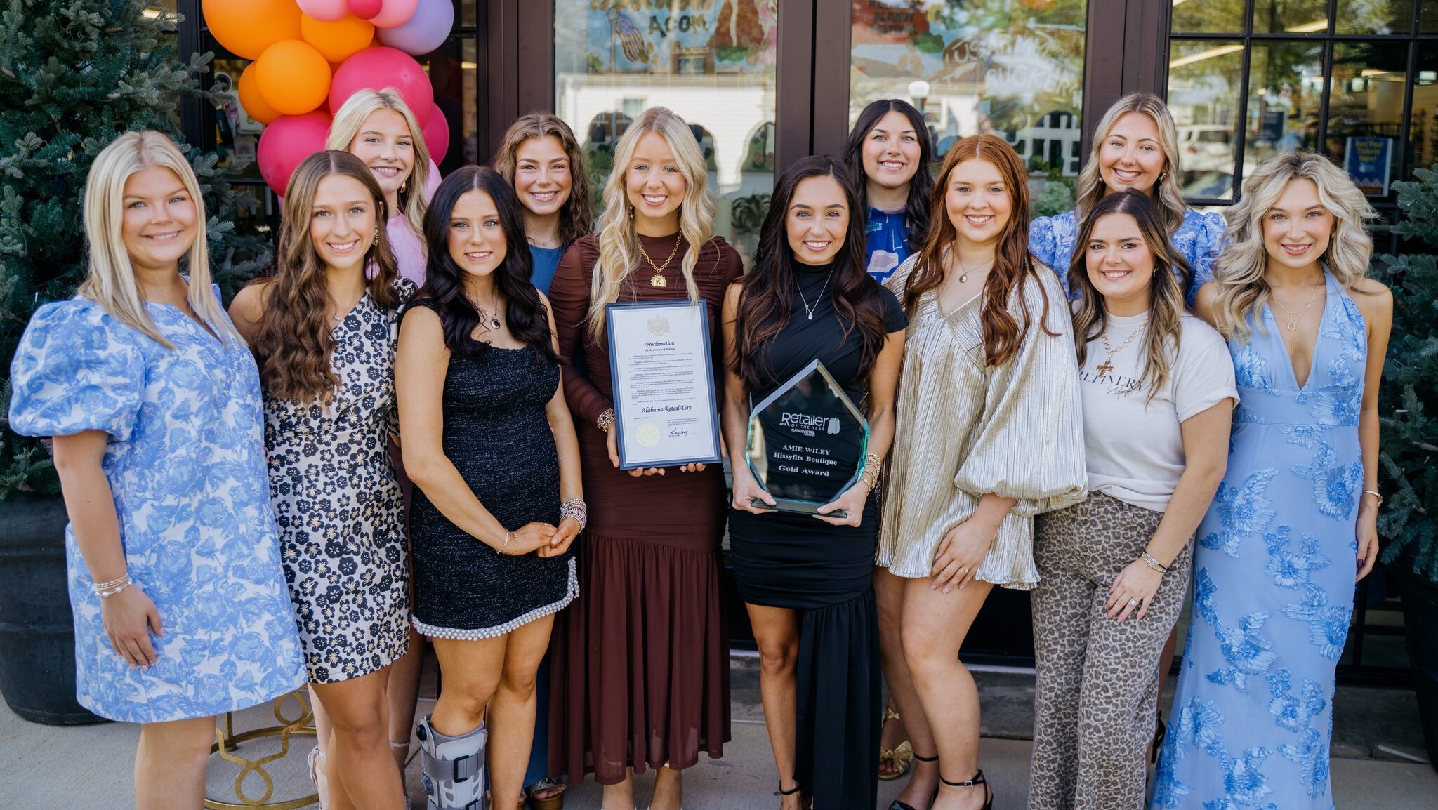 Women in front of boutique