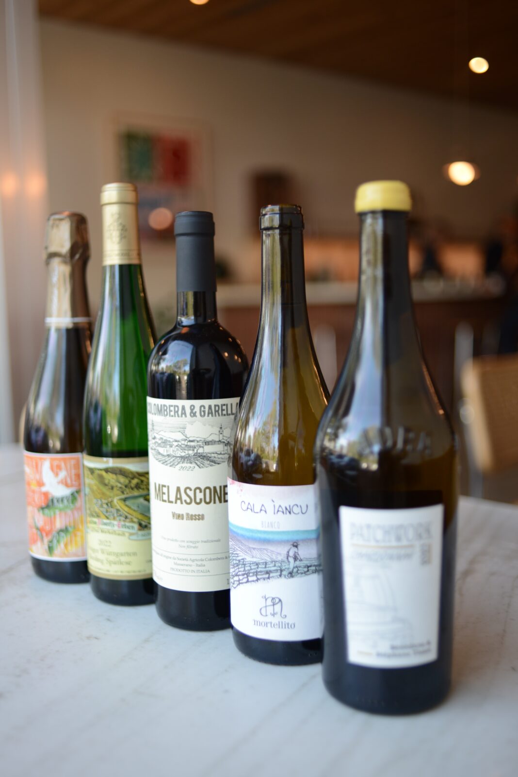 Wine bottles on table