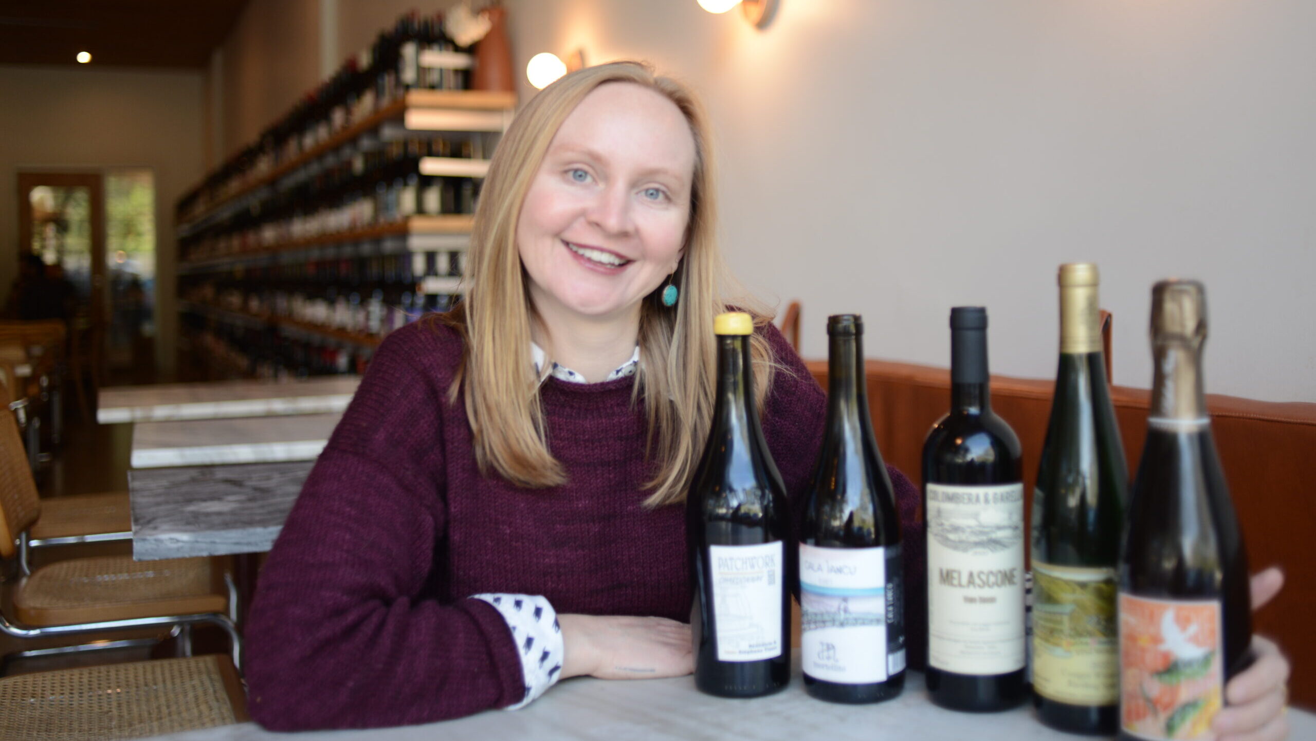 Kady with wine bottles