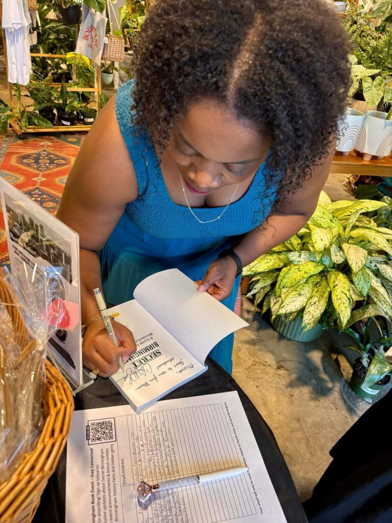 Cherith Fluker signing books