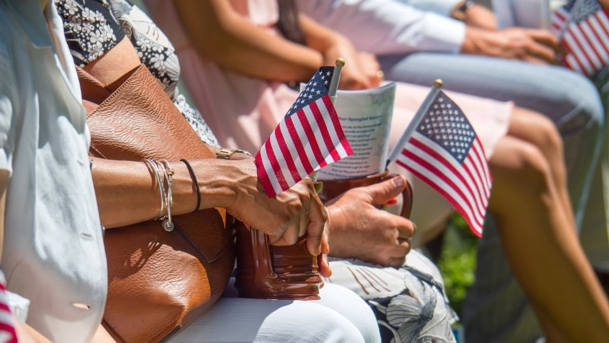 Women holding American flags