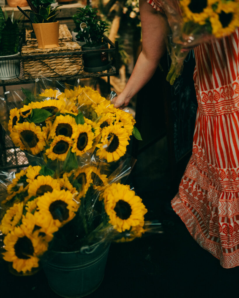 Kristen with sunflowers