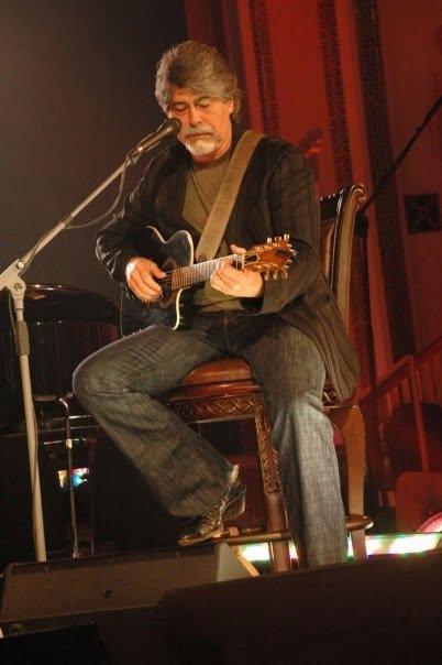 Randy Owen playing guitar